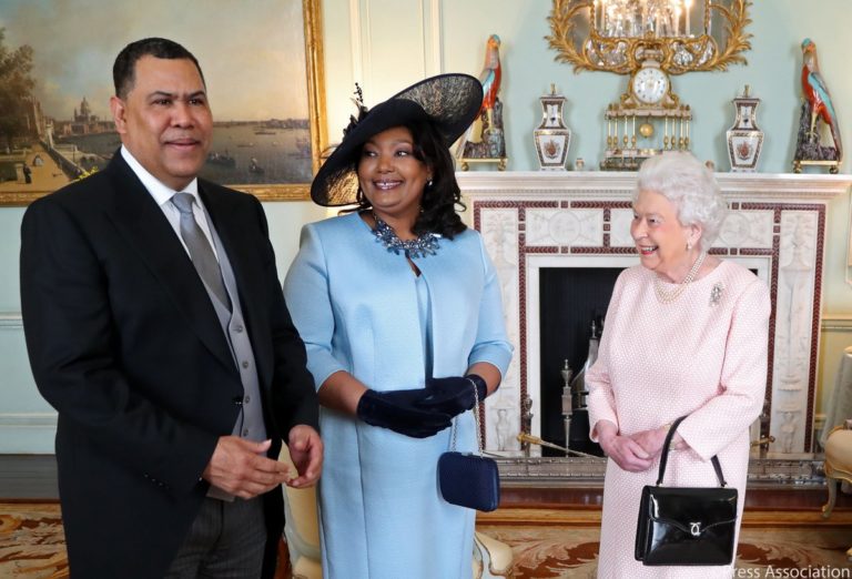 Greenslade, wife received by Queen Elizabeth II at Buckingham Palace