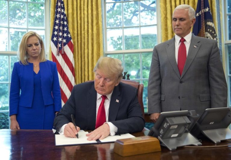 In reversal, Trump signs order stopping family separation