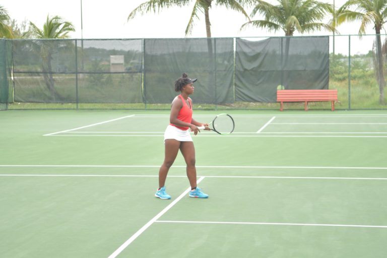 Clarke, Williams fall in doubles action