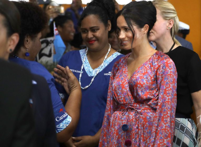 Meghan rushed through Fiji market filled with royal-watchers