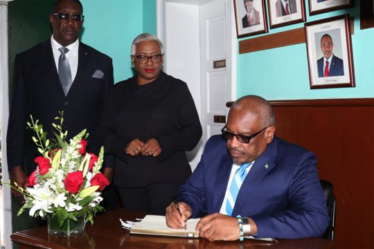 PM signs book of condolence