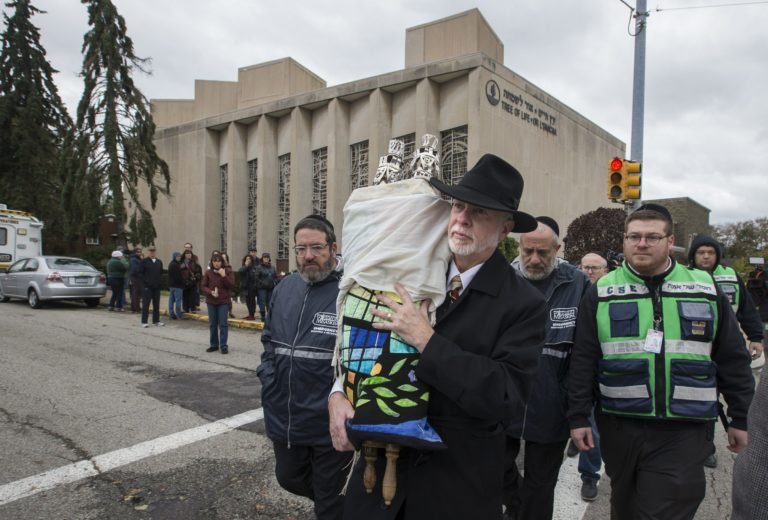 Rabbis gather up traces of Pittsburgh victims for burial