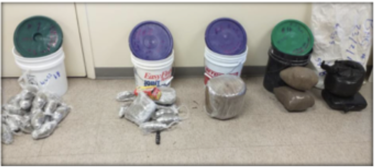 Suspected drugs found in buckets in Exuma bushes