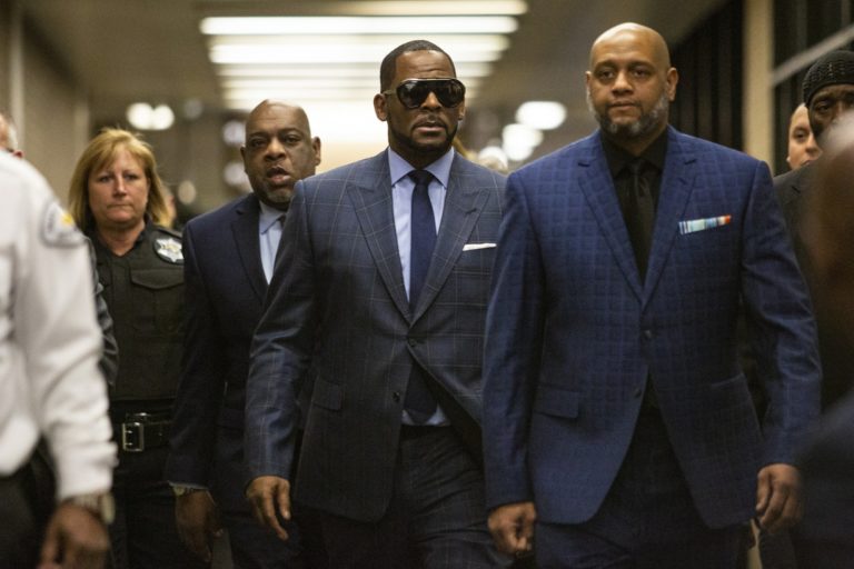 R. Kelly goes back to jail, takes risks with TV interview