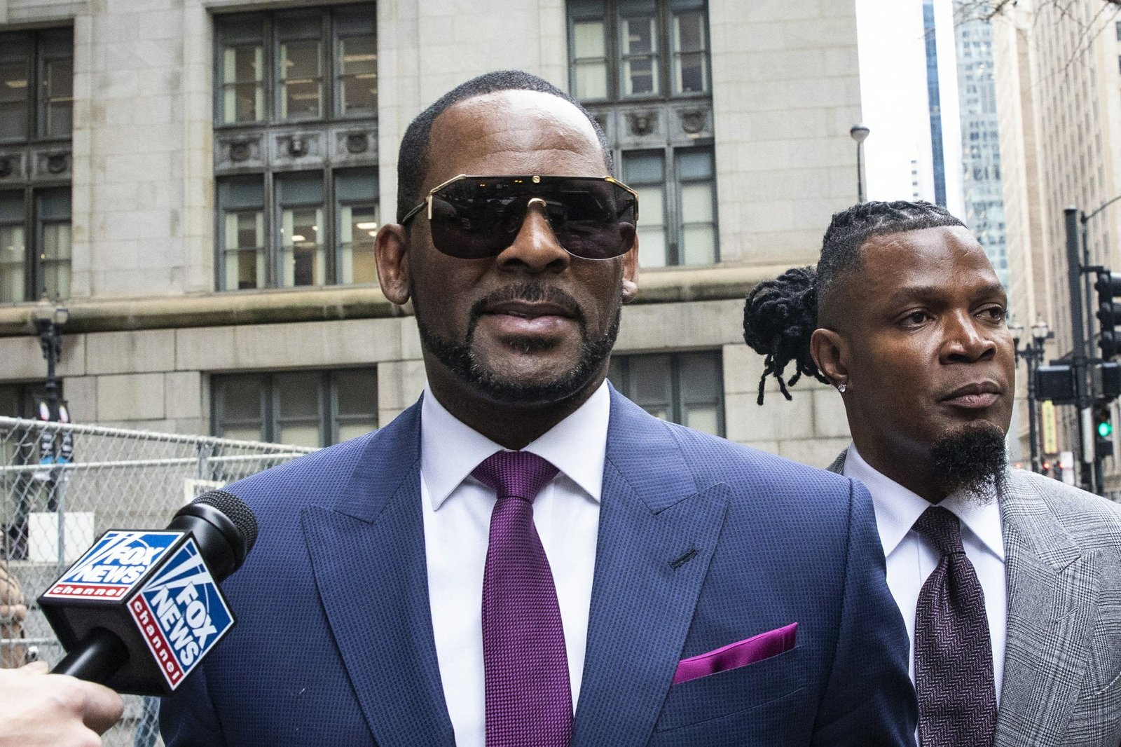 R. Kelly charged with 11 new sex-related counts in Chicago