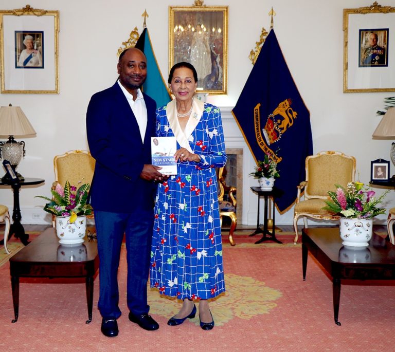 Cassius Stuart presents a copy of his book to the Governor General