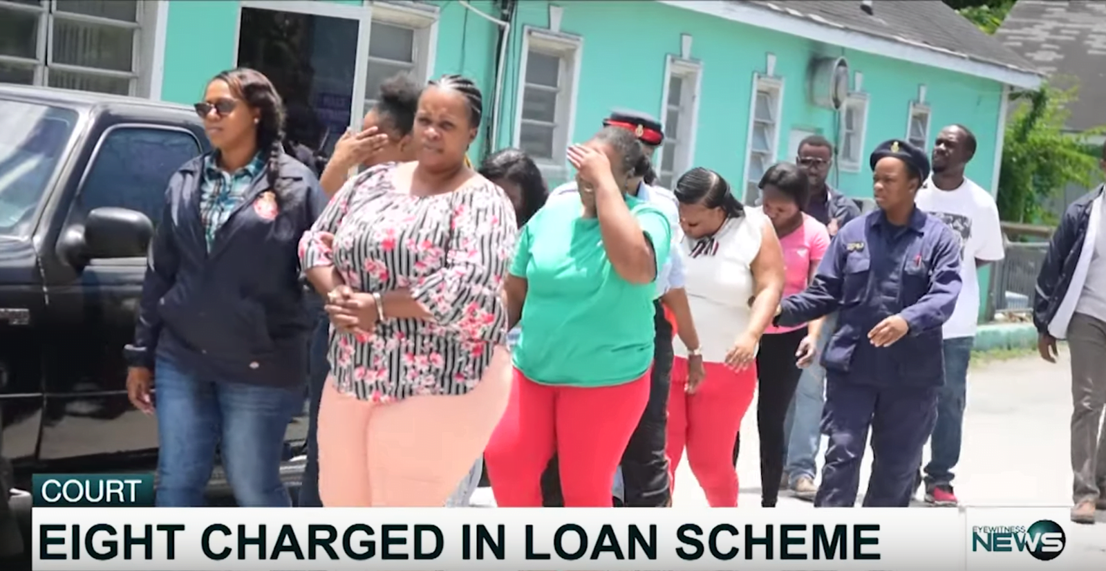 Eight appear in court on fraud-related charges