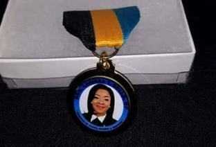 Outrage over Youth minister’s medallion