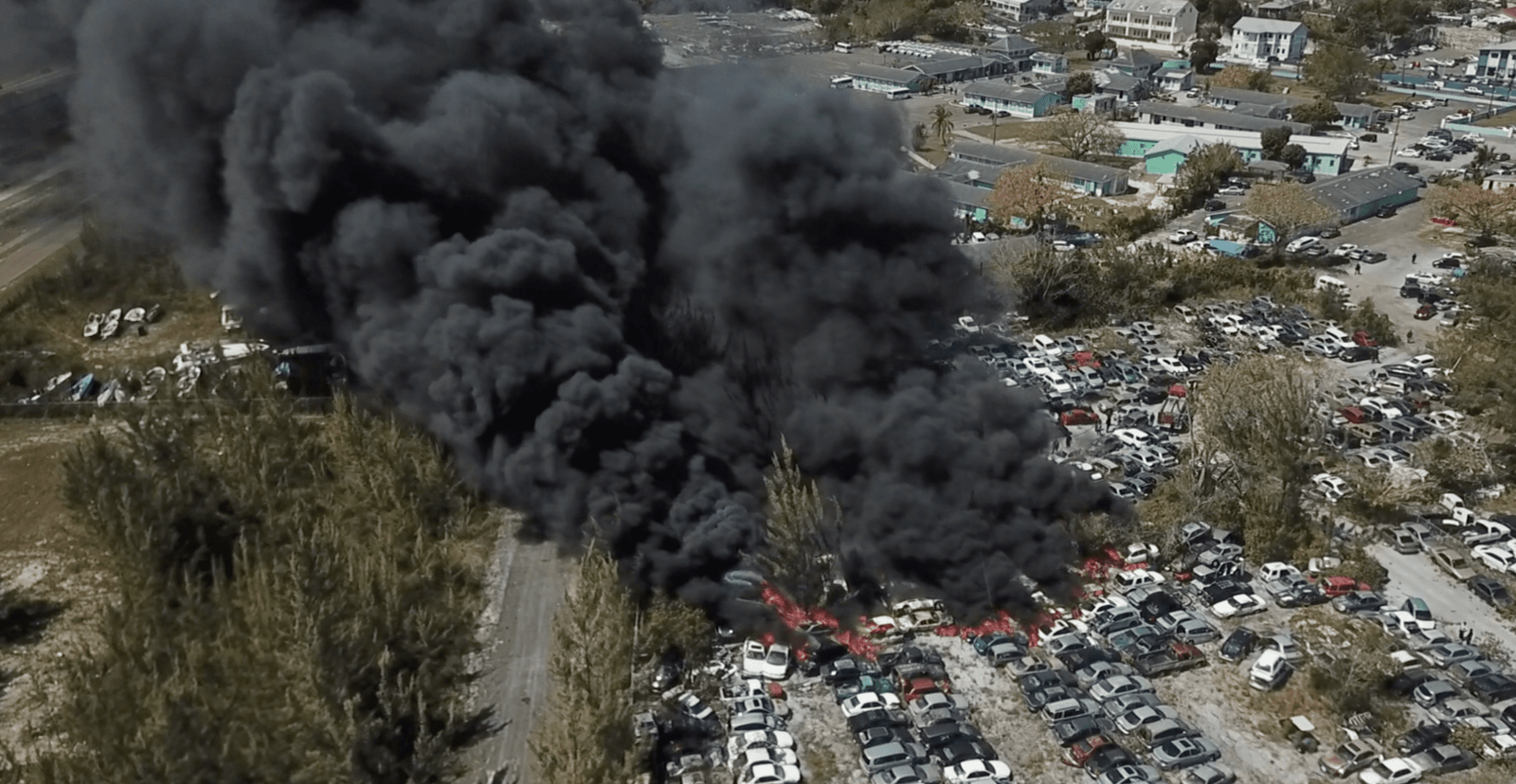 MASSIVE BLAZE DESTROYS MORE THAN 100 VEHICLES