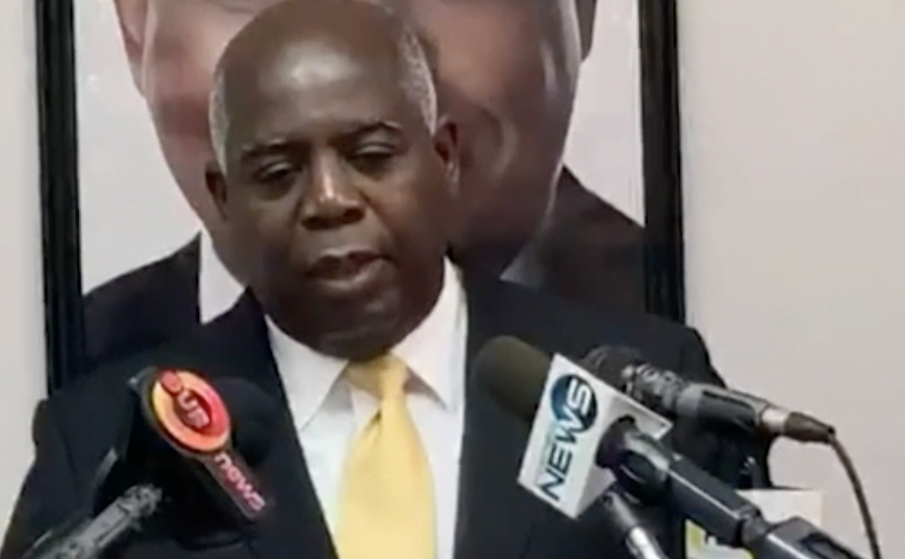 DAVIS ACCUSES GOVERNMENT OF DOUBLE STANDARD