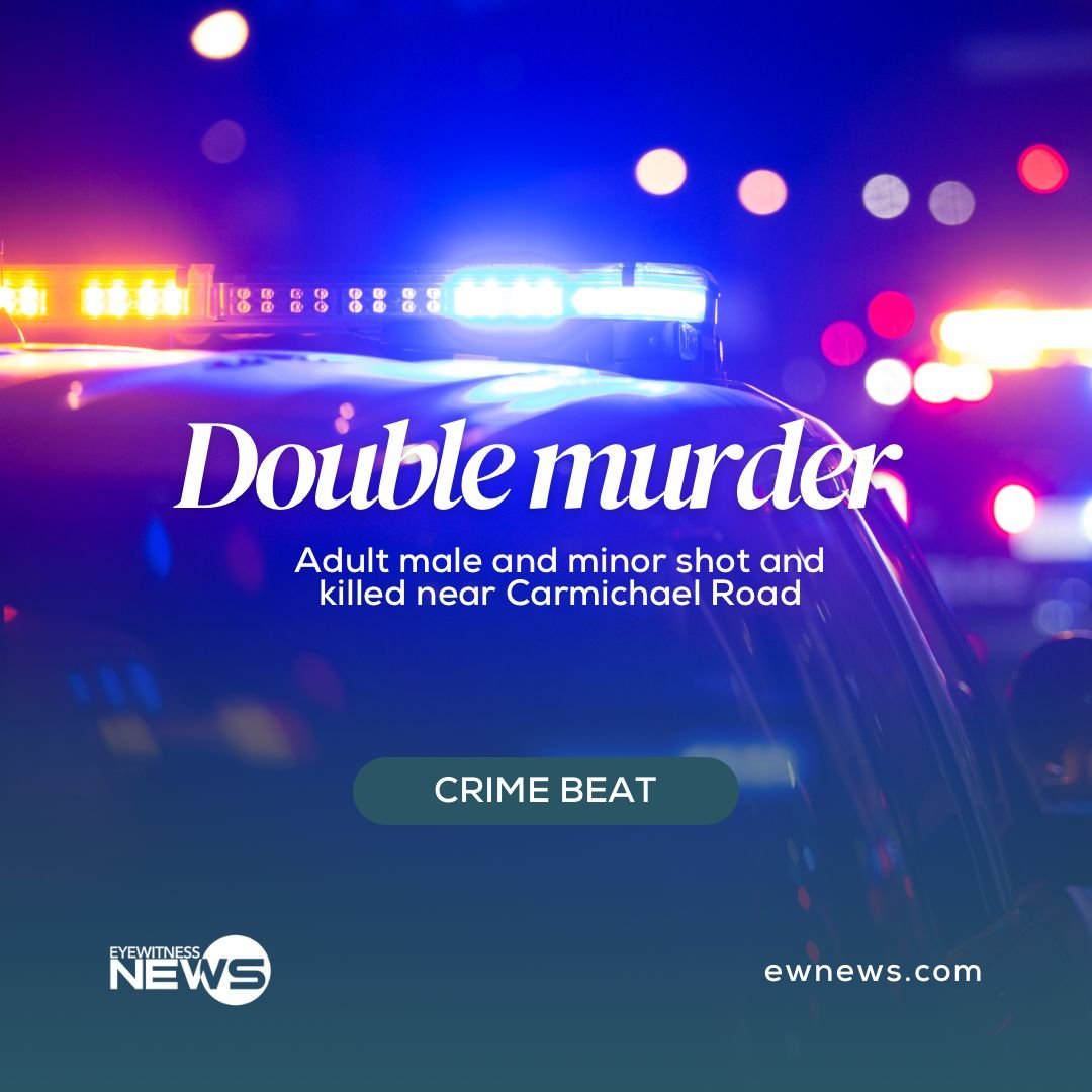 Straw market vendor admires her straw work